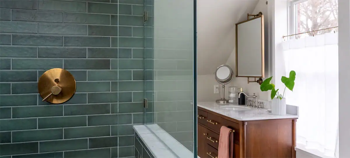 Green tile shower with brass hardware in master bathroom remodel