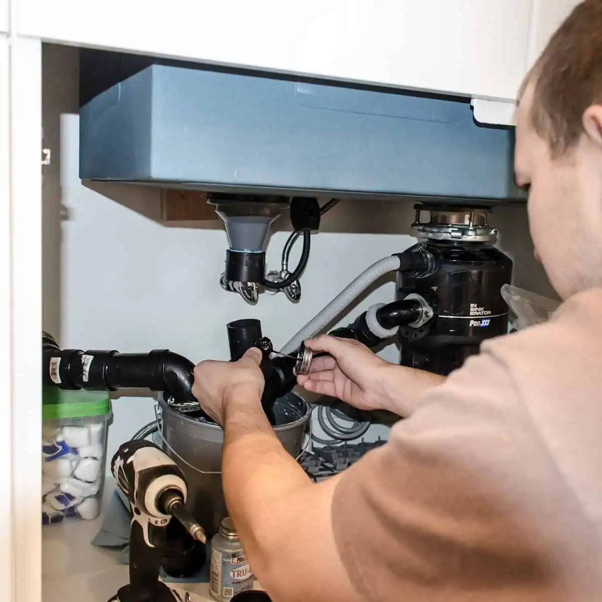 Plumbing and sink installation during kitchen remodel