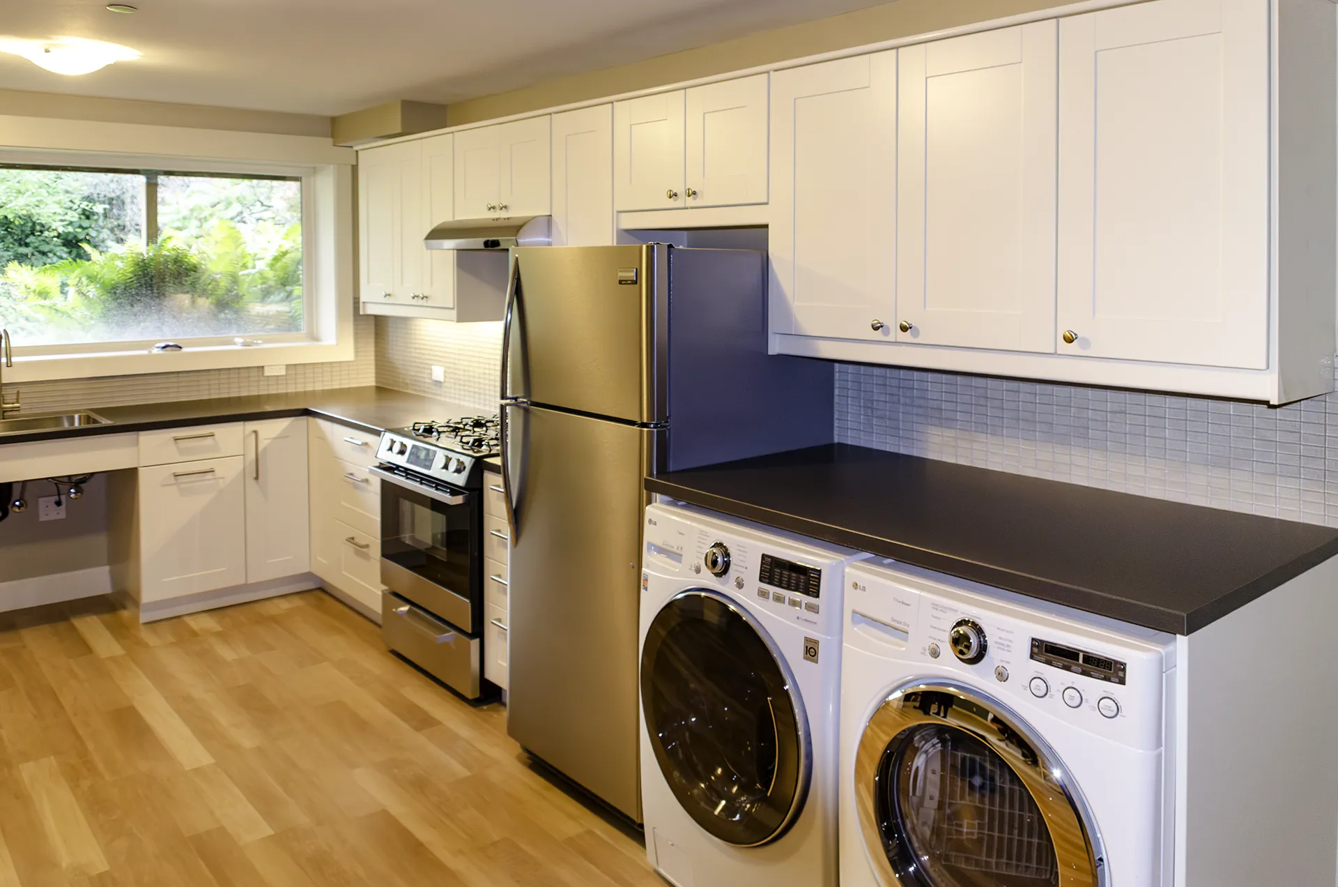 Basement apartment kitchen added as part of a full basement remodel in Normandy Park