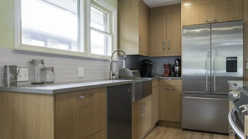 Custom fir cabinet doors with stainless steel farmhouse sink