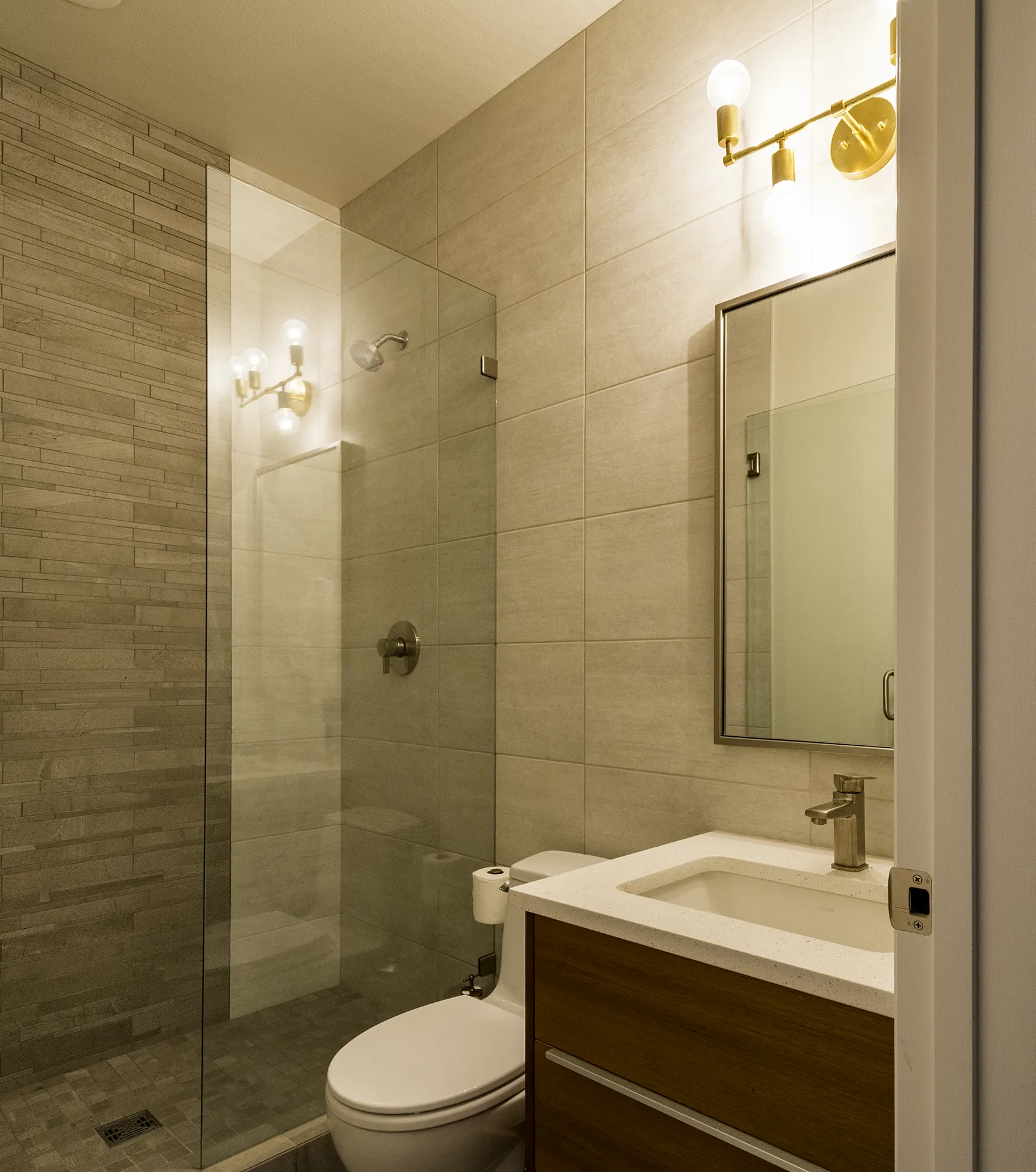 Tub-to-shower conversion with a tile walk-in shower and frameless glass enclosure, Issaquah bathroom remodel