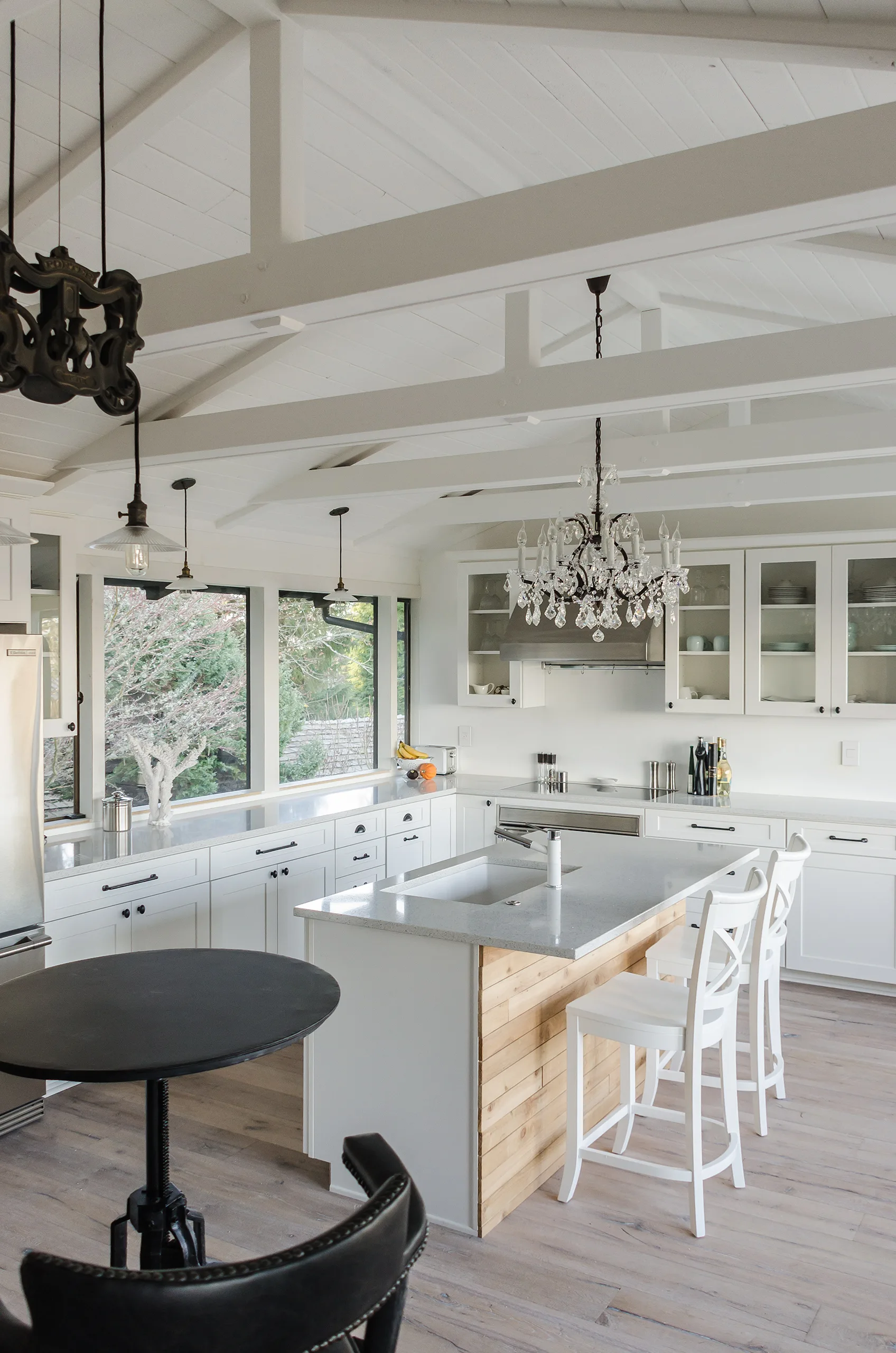 Completed Vashon Island kitchen remodel with custom kitchen cabinets and a quartz-topped island