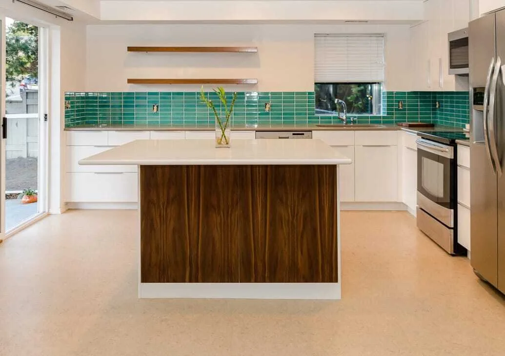 IKEA kitchen installation with high-gloss white and walnut doors
