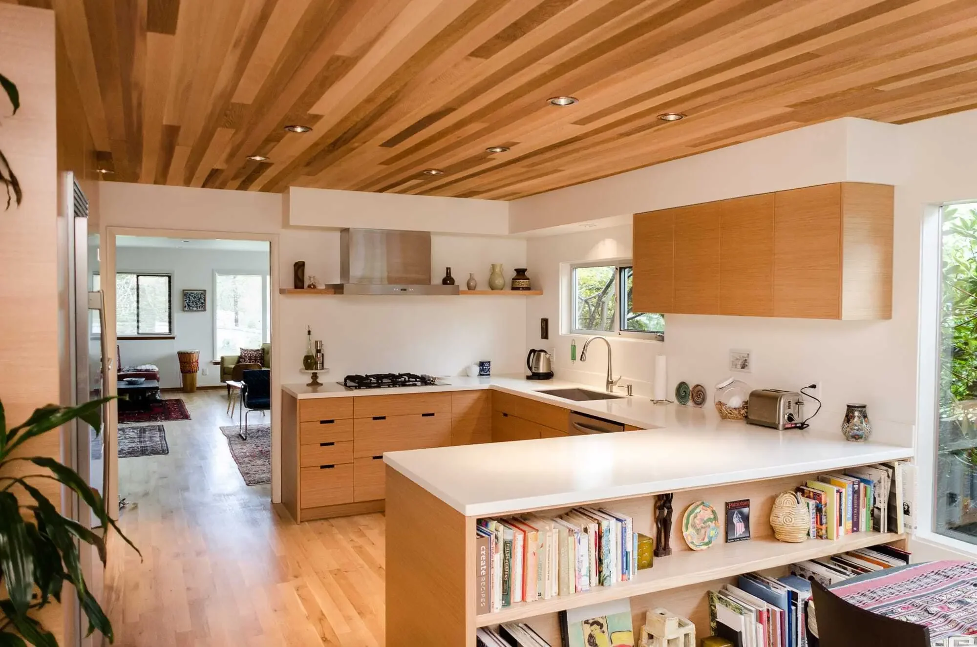 Refinished hardwood floors and T&G cedar clad ceiling