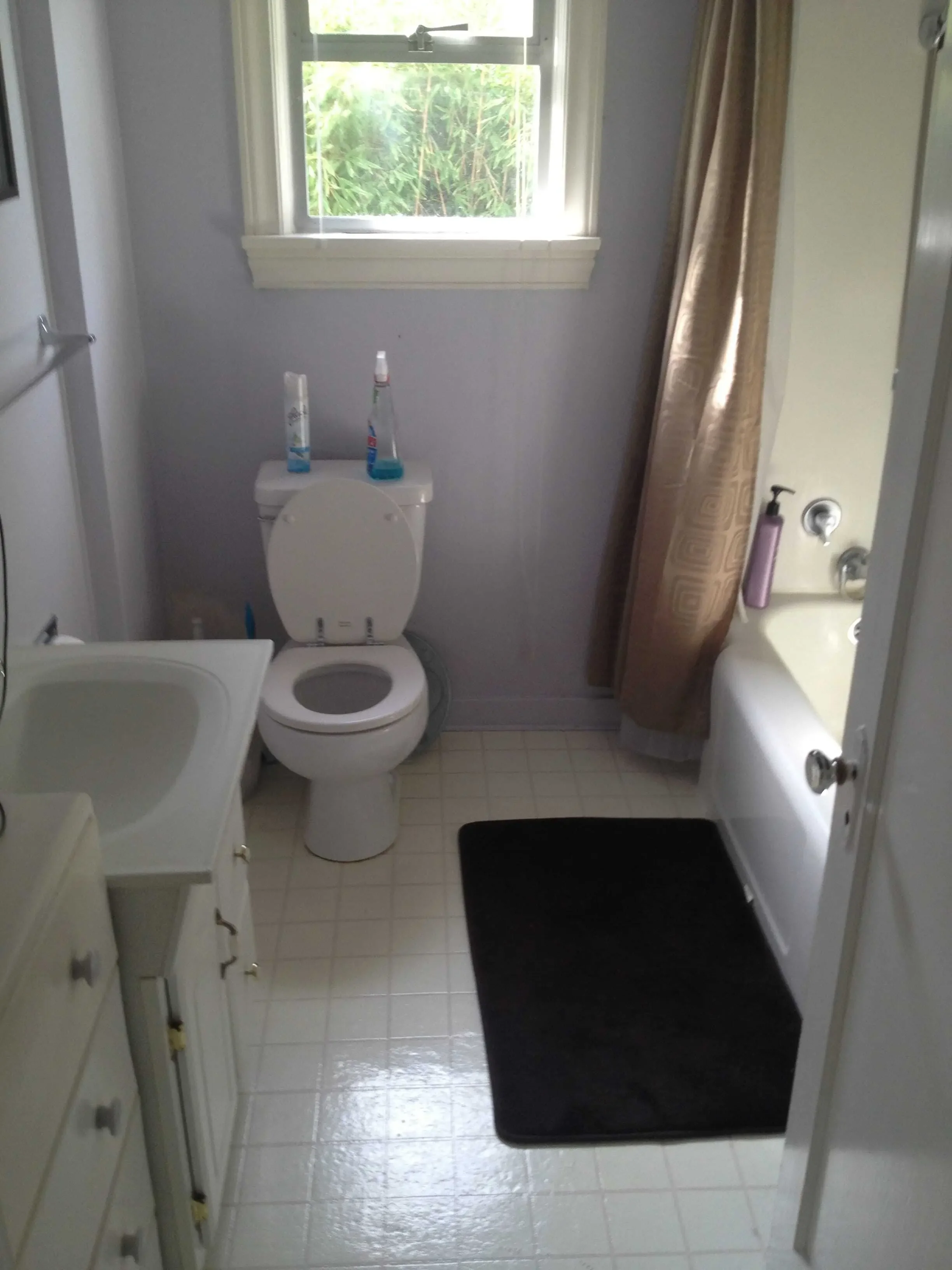 Poor layout in this old bathroom. The toilet position is really awkward. (before)