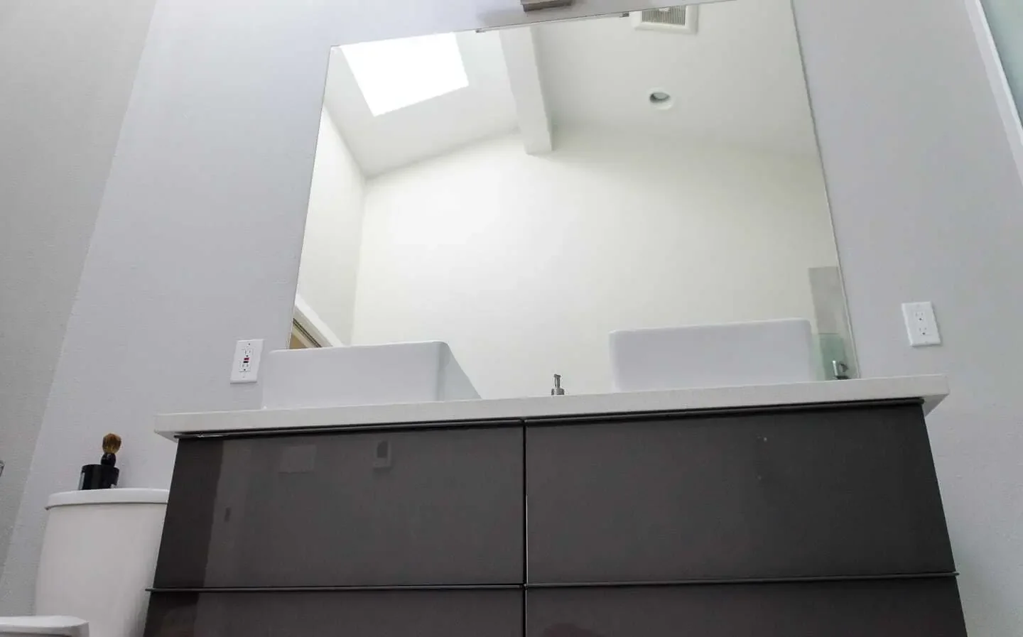 Vaulted ceiling and new skylight for bright spacious bathroom